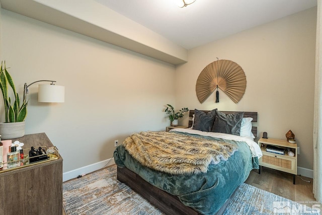 bedroom featuring hardwood / wood-style flooring