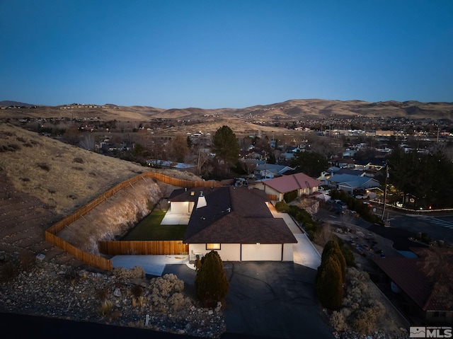 drone / aerial view featuring a mountain view