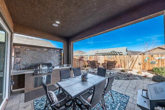 view of patio featuring grilling area