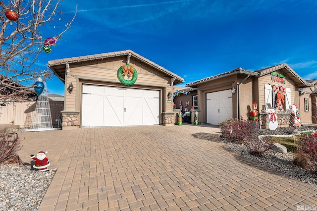 view of front of property featuring a garage