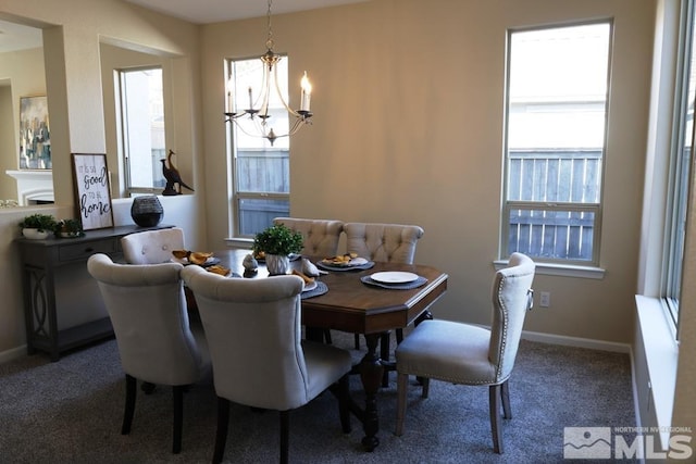 carpeted dining room with a notable chandelier