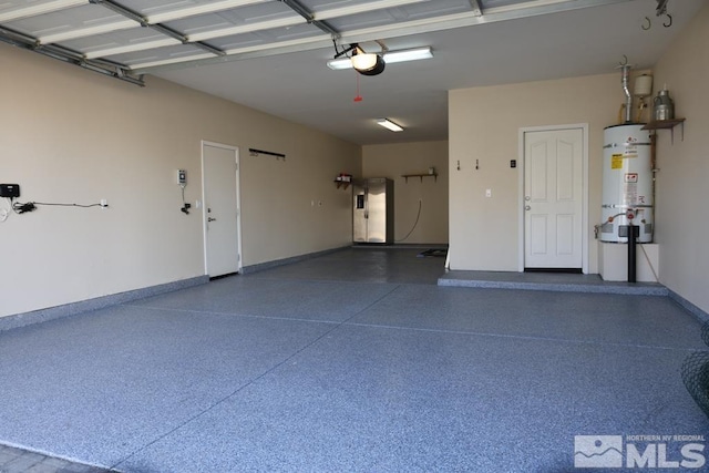 garage with a garage door opener and water heater