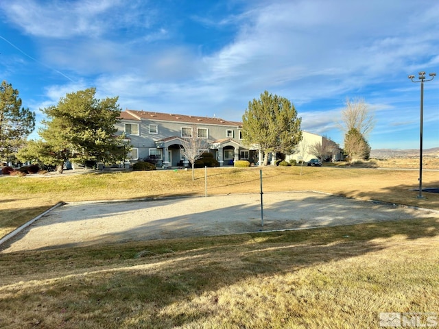 exterior space with a yard