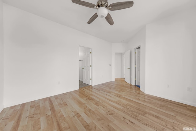 unfurnished room featuring ceiling fan and light hardwood / wood-style floors