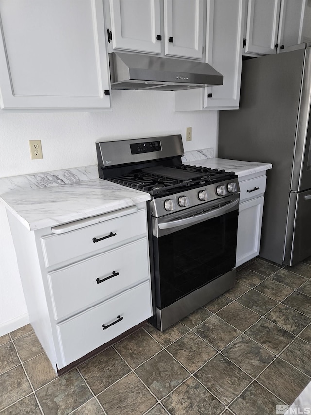 kitchen featuring stainless steel appliances, white cabinets, under cabinet range hood, and light stone counters