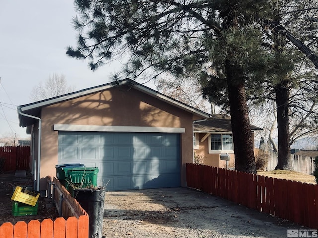 exterior space featuring a garage