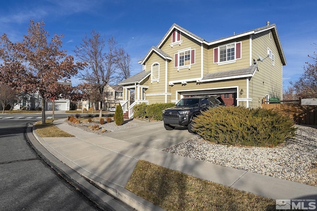 view of front of home with a garage