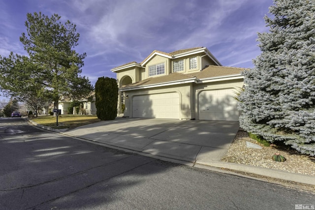 view of property featuring a garage