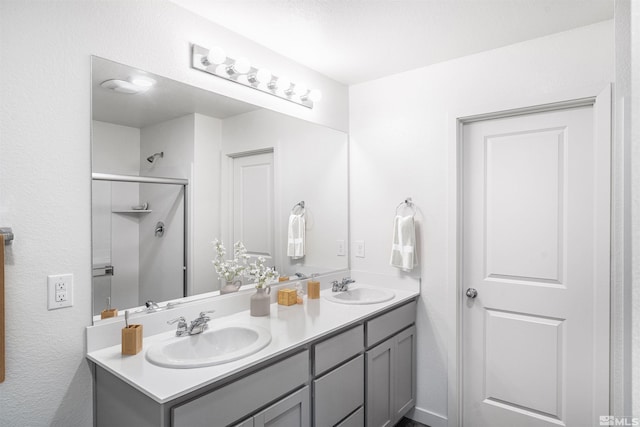 bathroom featuring vanity and walk in shower