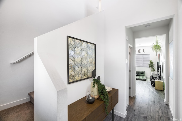 corridor with dark hardwood / wood-style floors