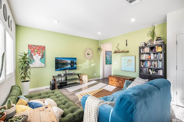 living room featuring hardwood / wood-style flooring and plenty of natural light