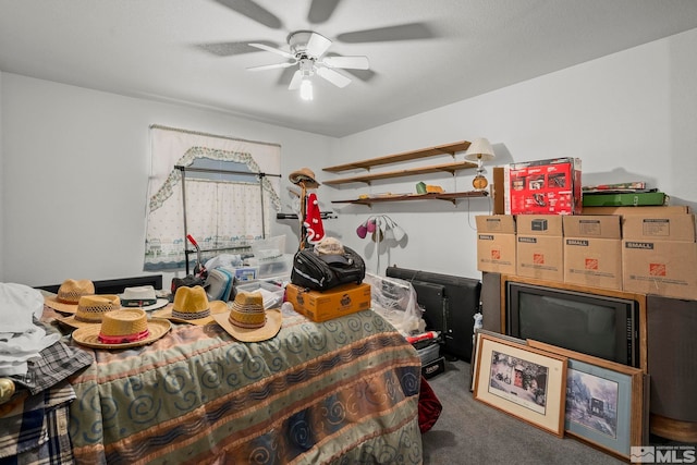 bedroom featuring ceiling fan and carpet floors