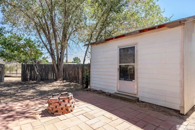 view of patio / terrace featuring an outbuilding