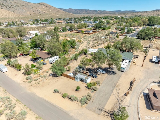 drone / aerial view featuring a mountain view