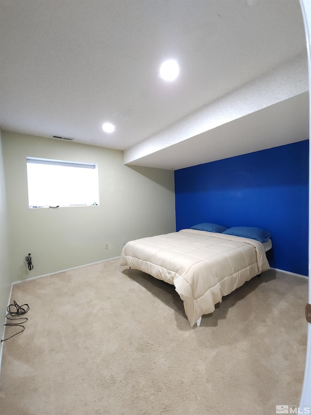 bedroom featuring carpet