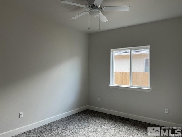 unfurnished room with carpet and ceiling fan