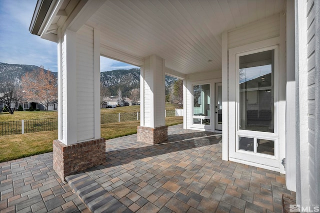 view of patio / terrace featuring a mountain view