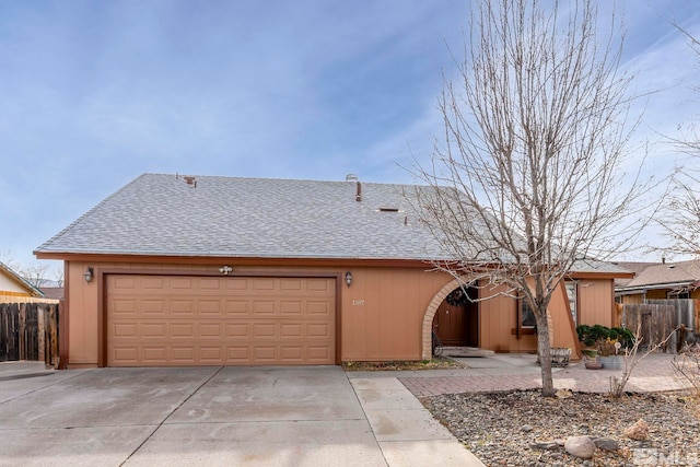 single story home featuring a garage