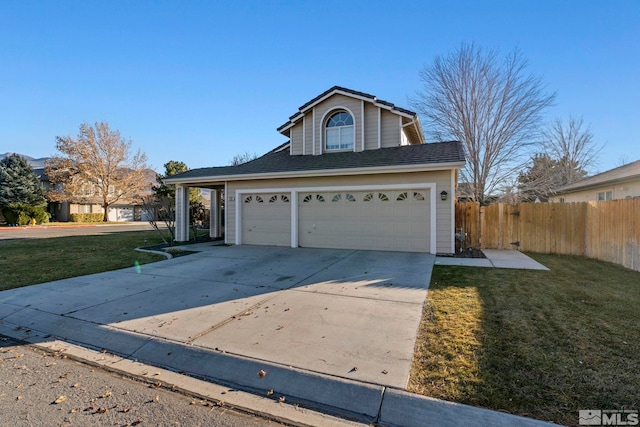 front facade with a front yard and a garage