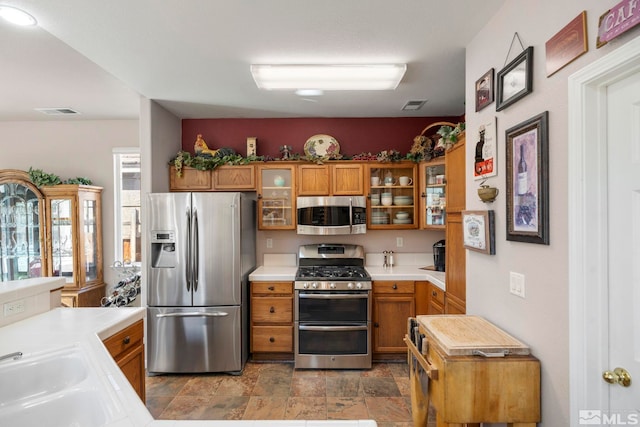 kitchen featuring sink and appliances with stainless steel finishes