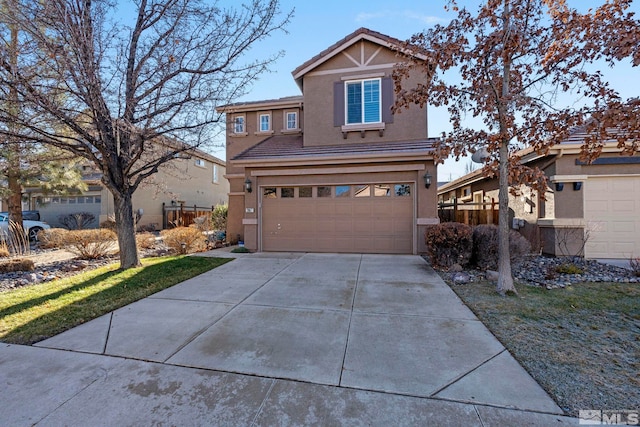 front of property featuring a garage