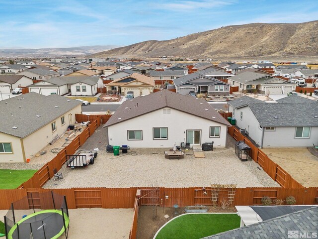 drone / aerial view featuring a mountain view