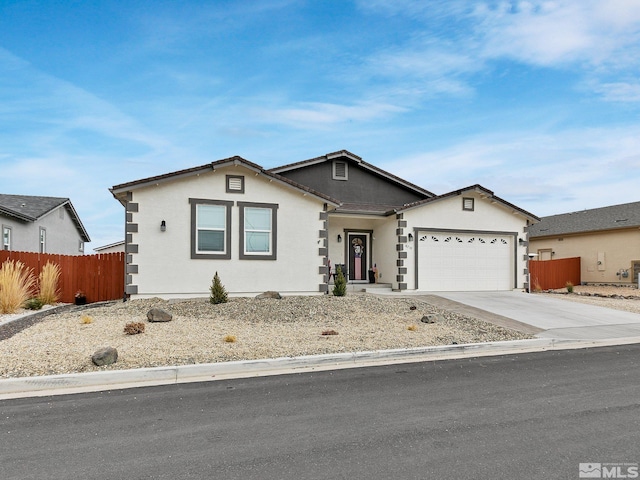 ranch-style house featuring a garage