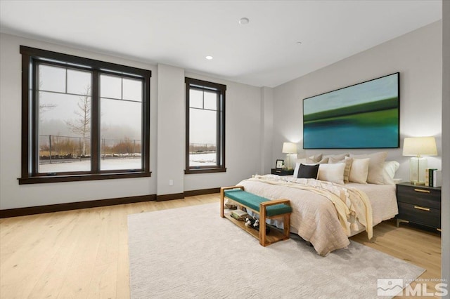 bedroom featuring light wood-type flooring