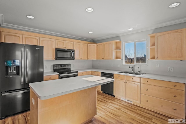 kitchen featuring sink, black appliances, and light brown cabinets