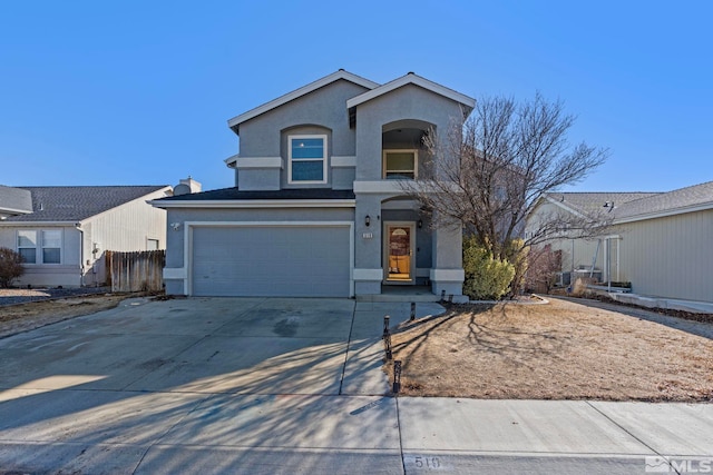 view of front of property featuring a garage