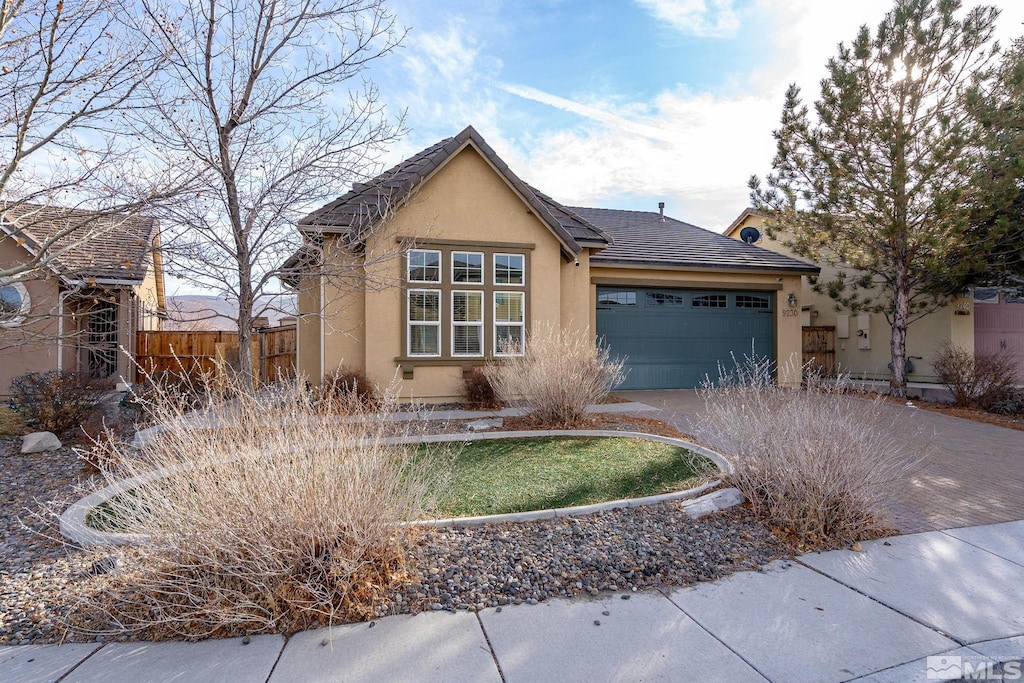 ranch-style house with a garage