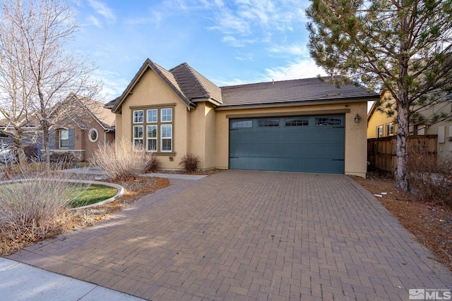 view of front of home with a garage