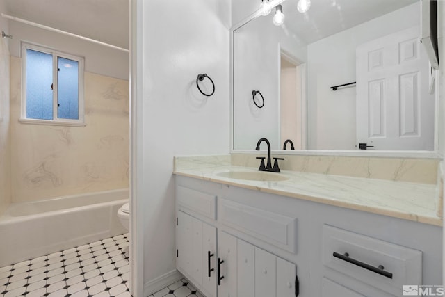 full bathroom with tile patterned flooring, vanity, shower / bathtub combination, and toilet