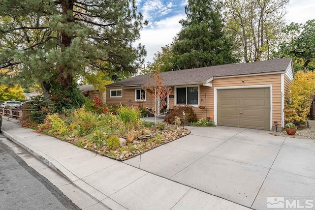 single story home featuring a garage