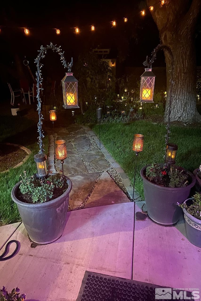 view of patio at twilight