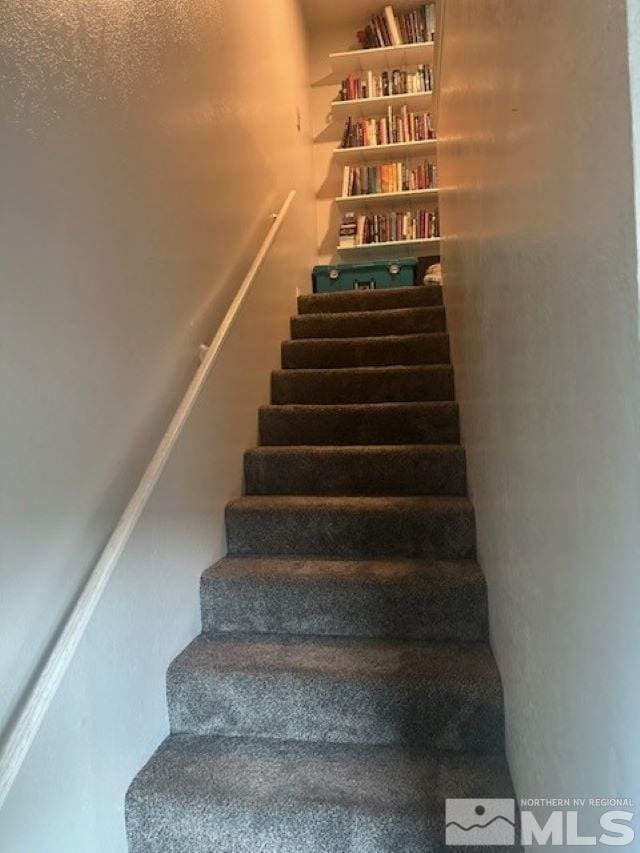 stairs with concrete floors