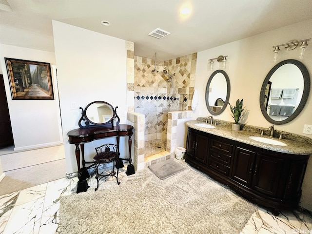 bathroom featuring vanity and walk in shower