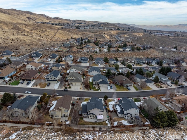 drone / aerial view featuring a mountain view