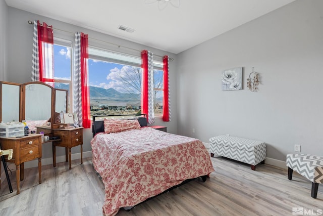 bedroom featuring light hardwood / wood-style floors