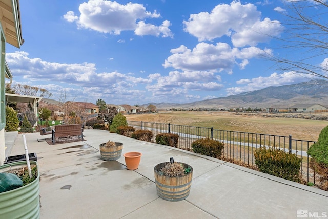 view of patio / terrace with a mountain view