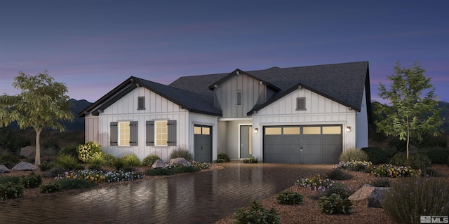 modern inspired farmhouse with a garage