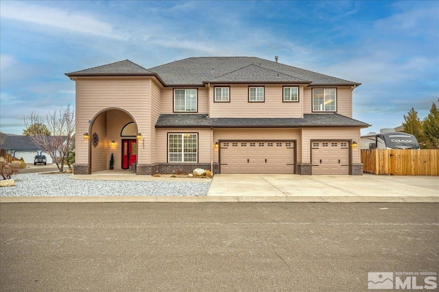 view of front of property with a garage