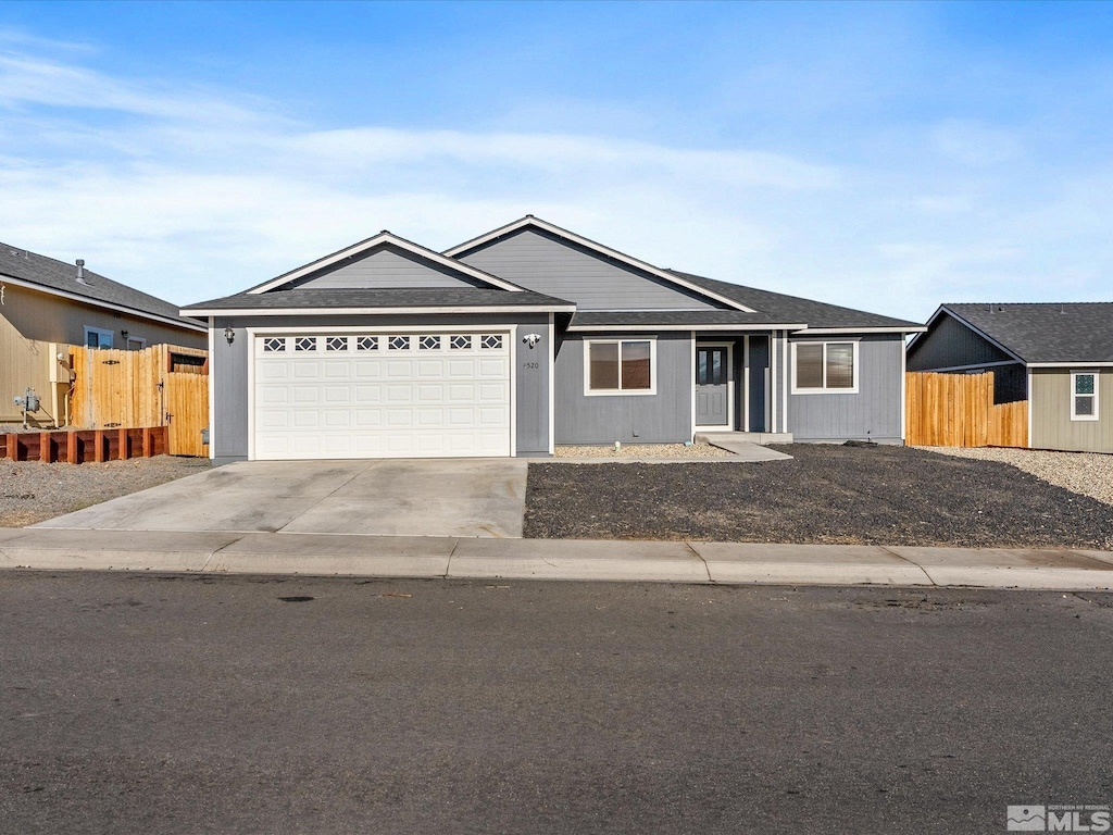 ranch-style home with a garage