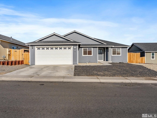 ranch-style home with a garage