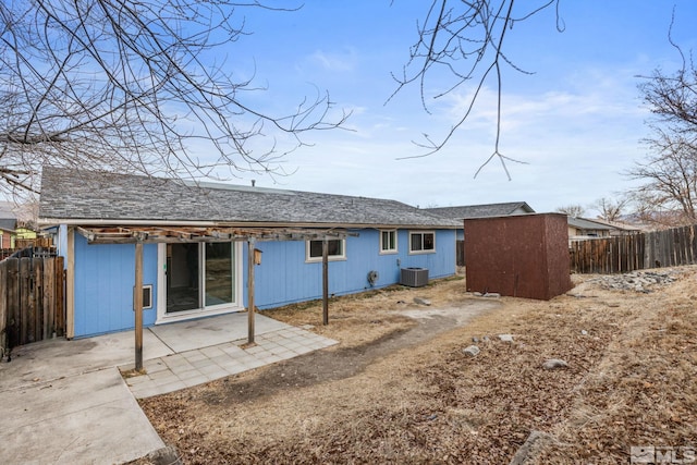 back of property with a patio area and cooling unit