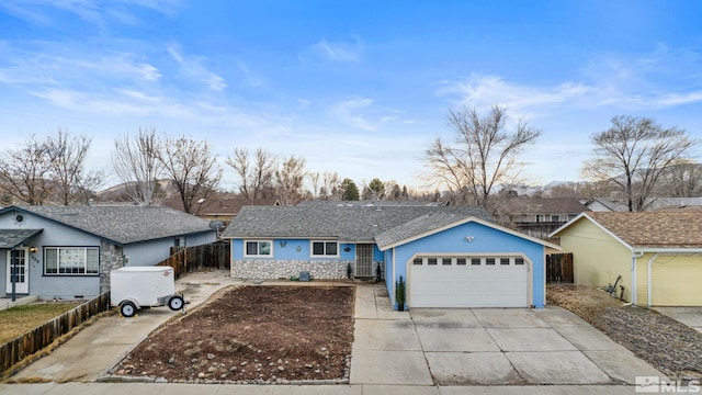 single story home with a garage