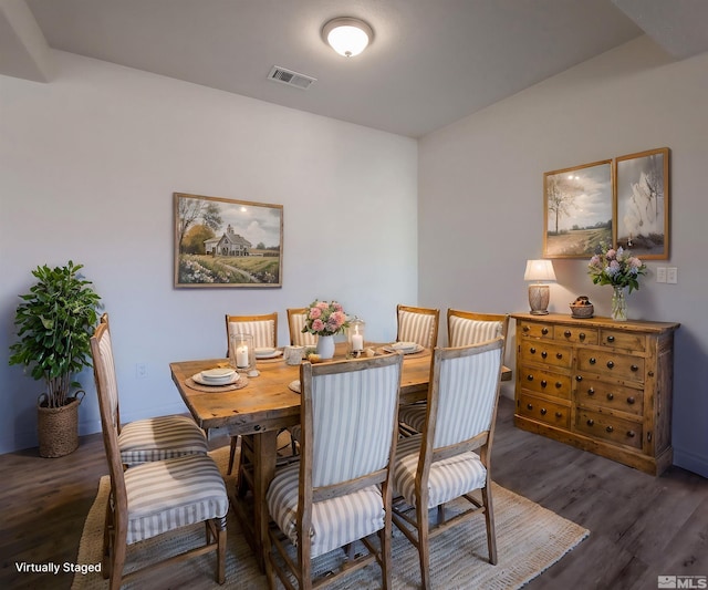 dining room featuring dark hardwood / wood-style floors