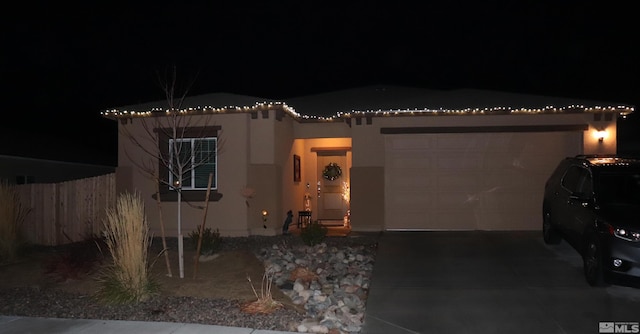 view of front of home featuring a garage