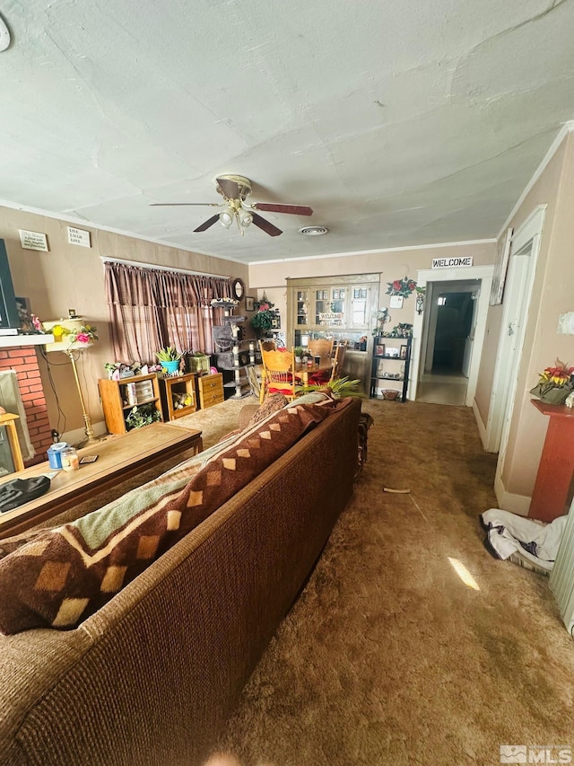 living room featuring carpet flooring and ceiling fan