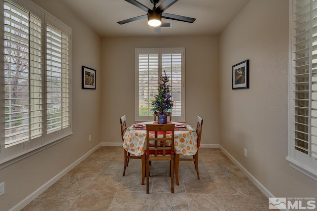 dining room with ceiling fan